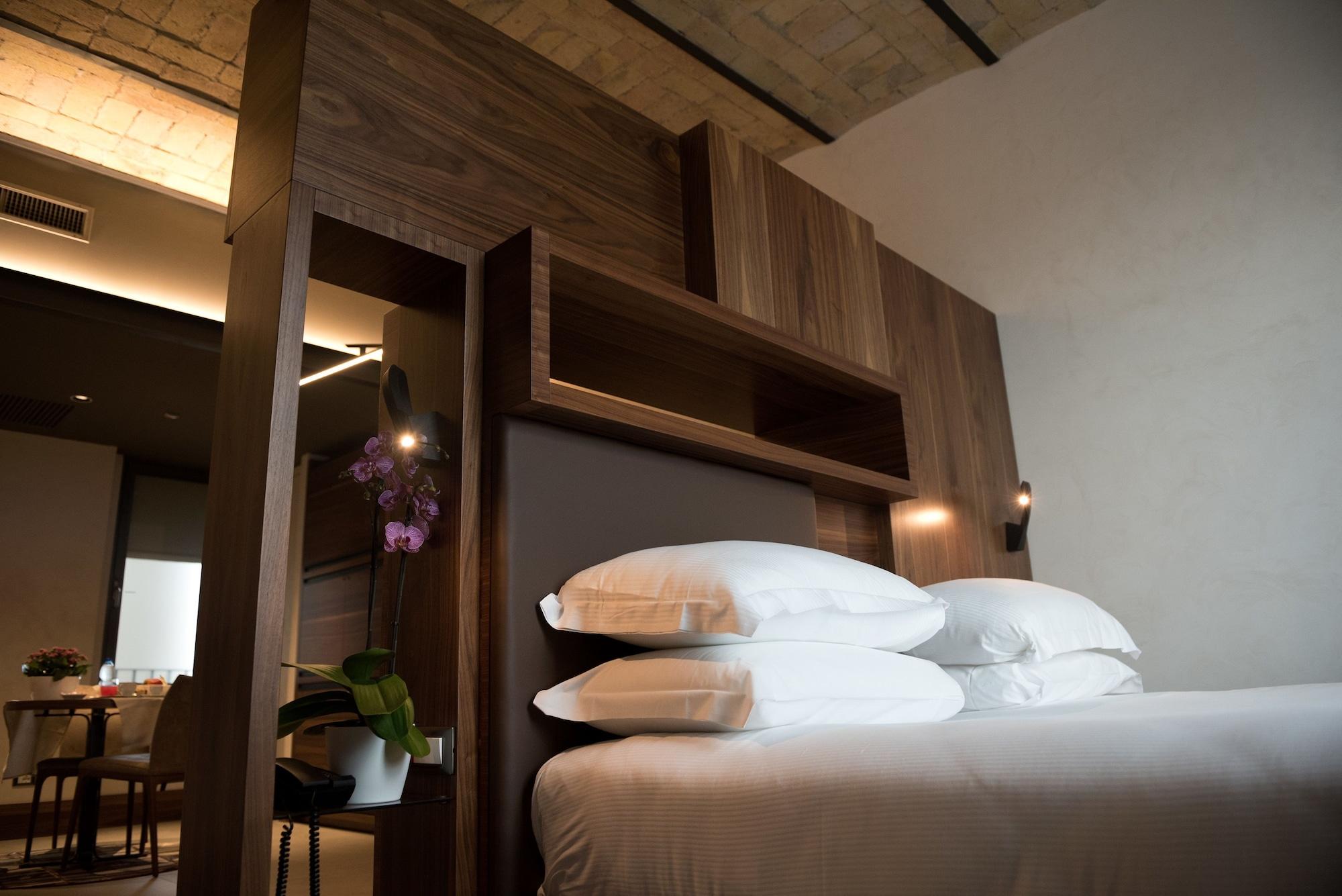 Gasometer Urban Suites Rome Exterior photo A bedroom at the hotel