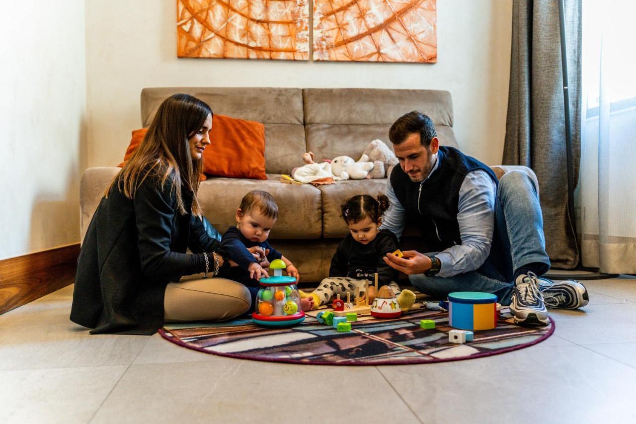 Gasometer Urban Suites Rome Exterior photo Family playing with toys
