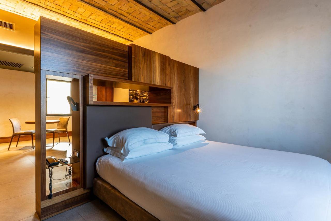 Gasometer Urban Suites Rome Exterior photo A bedroom at the hotel