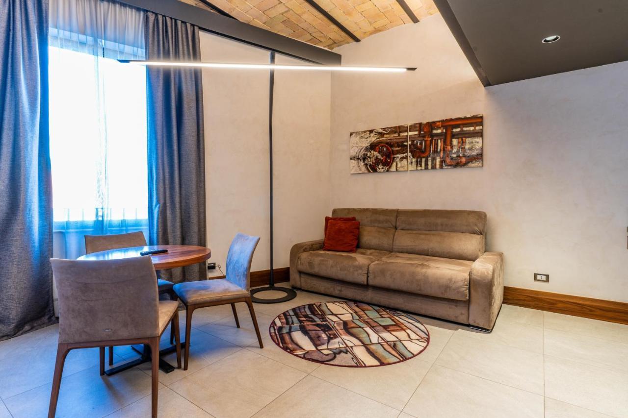 Gasometer Urban Suites Rome Exterior photo A living room in a hotel