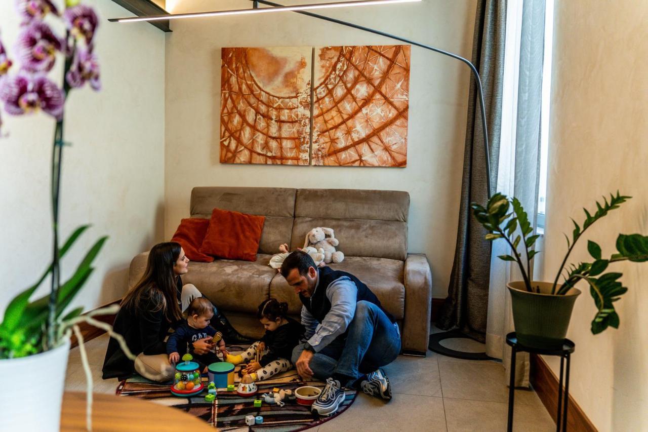 Gasometer Urban Suites Rome Exterior photo A family playing with toys in a living room