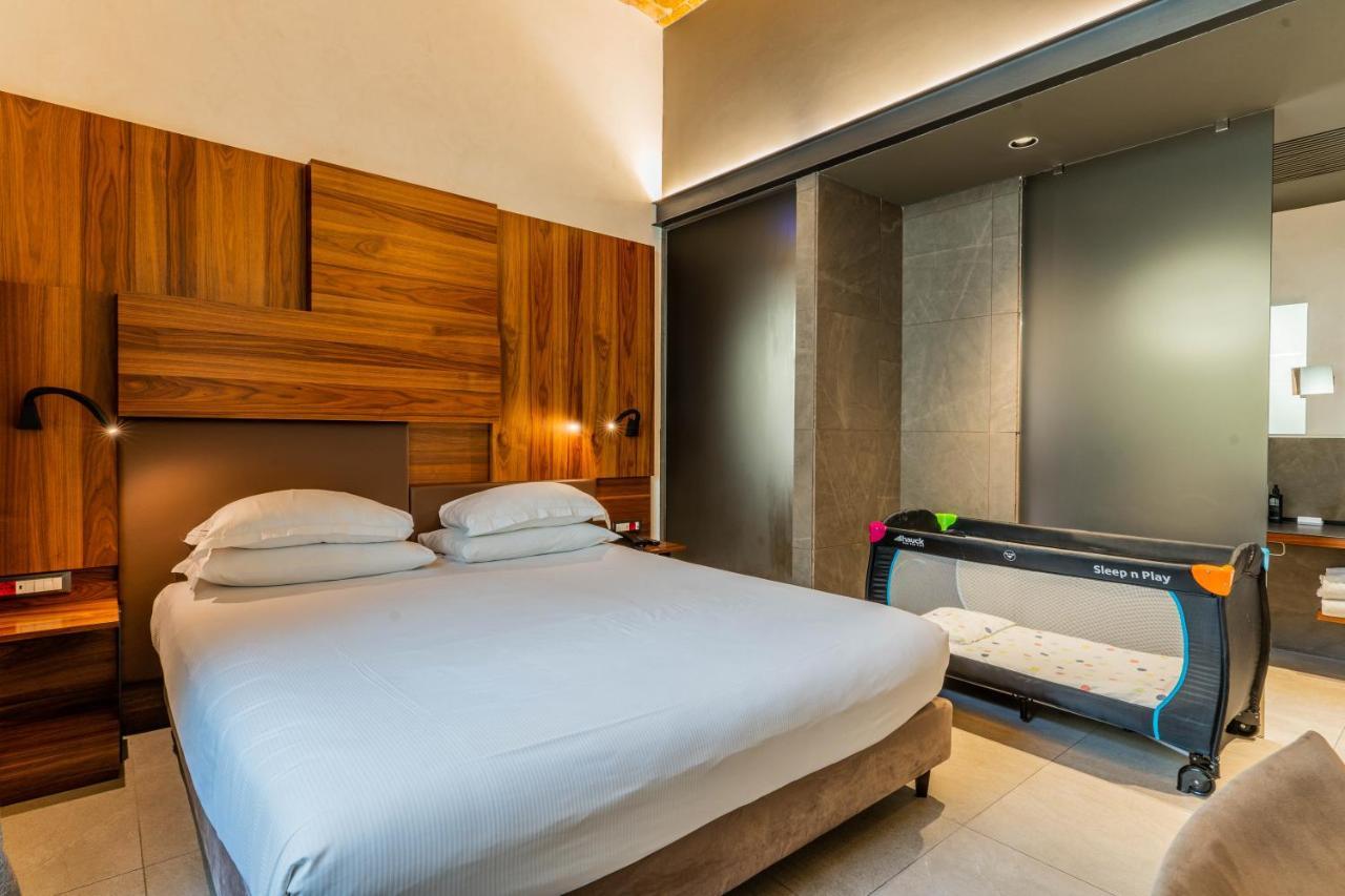 Gasometer Urban Suites Rome Exterior photo Family room