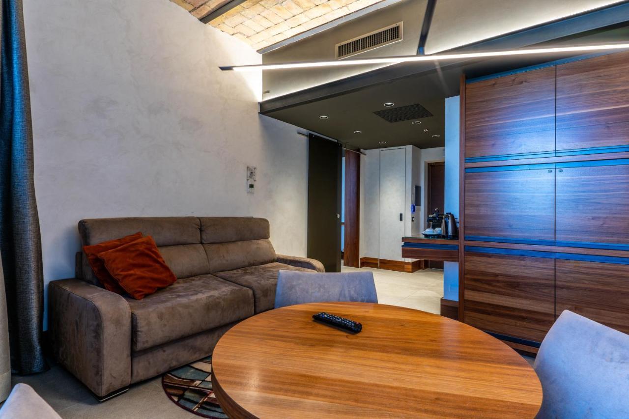 Gasometer Urban Suites Rome Exterior photo The interior of a suite at the hotel