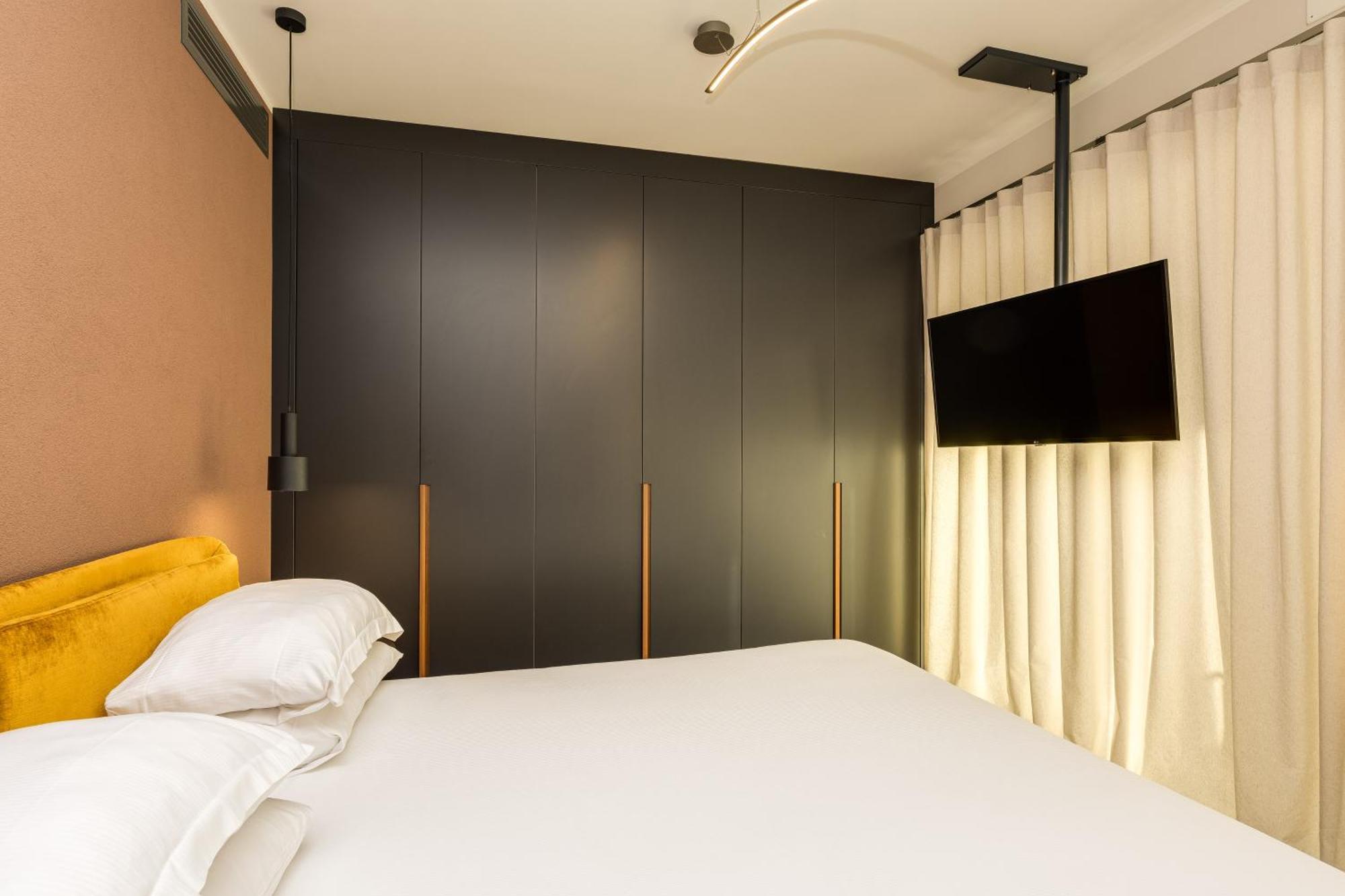 Gasometer Urban Suites Rome Exterior photo A bedroom at the hotel