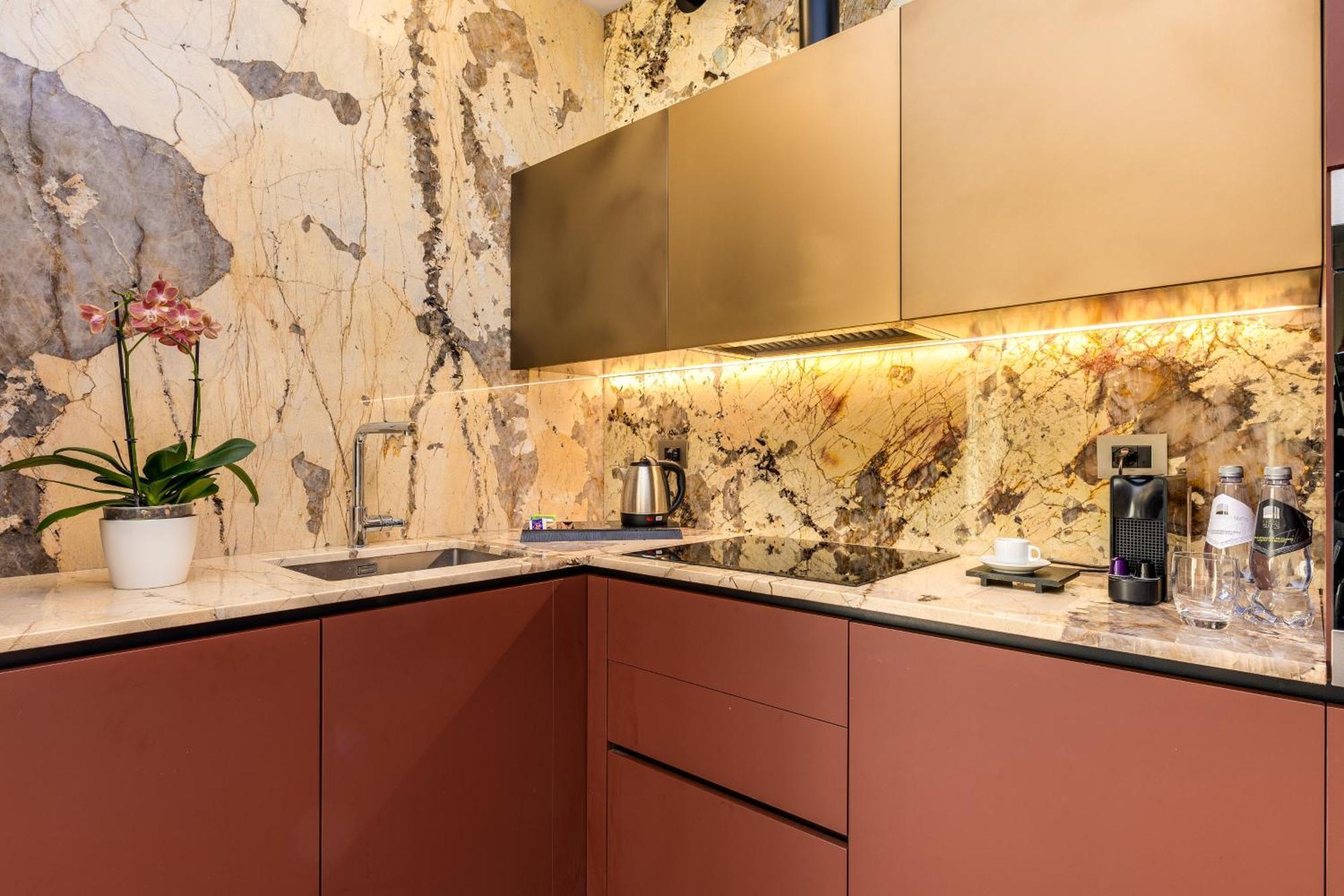 Gasometer Urban Suites Rome Exterior photo A kitchen with a granite countertop